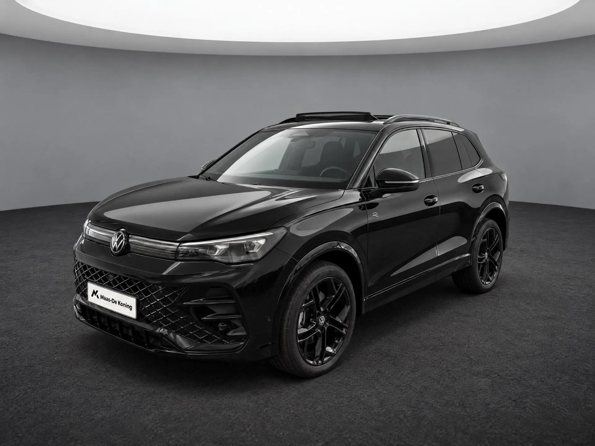 Volkswagen Tiguan — foto 1
